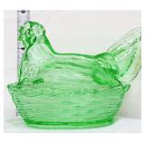 Green glass hen on nest