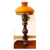 Vintage wall sconce with amber glass shade
