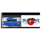 Die cast STP race team semi in box
