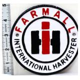 Cast iron round 4.5in Farmall plaque