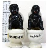 2 vntg americana boys on toilet figures
