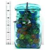 Vintage blue fruit jar w/ marbles inside
