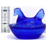 MIniature cobalt hen on nest