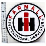 Cast iron round 4.5in Farmall plaque