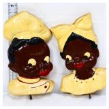 Pair vntg americana chalkware child face plaques