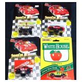 Lot of 4 toy race cars in org packages