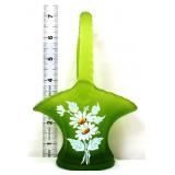 Green satin glass basket w/ white flowers
