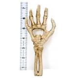 Cast iron skeleton hand bottle opener