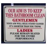 Metal embossed Our Aim Bathroom sign