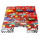 Lot of 9 Racing semi trucks in packages