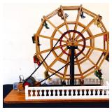 Vintage folk art mechanical ferris wheel, works