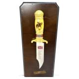 Single blade knife on plaque
