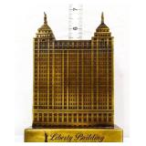 Vntg metal Liberty Building coin bank