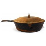 Vintage cast iron skillet with lid