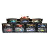 Lot of 12 small race cars, 11 in boxes