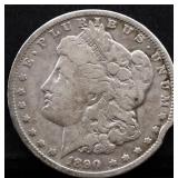 1890O Morgan silver dollar