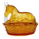 Vintage amber glass horse on nest