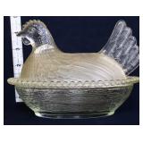 Clear satin hen on nest