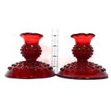 Pair of red hobnail candleholders