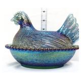 Vintage blue carnival hen on nest