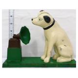 Cast iron dog at phonograph bank