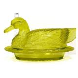 Vaseline glass duck on nest