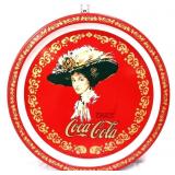 Round metal Coca Cola lady portrait tray