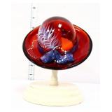 Fenton amberina hat w/ purple feather on stand