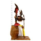 Paper mache seated Don Quixote figure