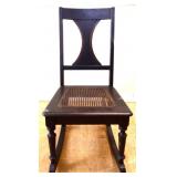Vintage cane bottom rocking chair