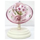 Fenton pink hat w/ white flowers on stand