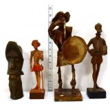 Lot of 4 assorted man figural statues