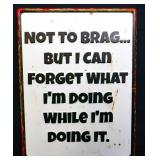 Metal Not To Brag sign