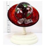 Fenton red hat w/ white flowers on stand