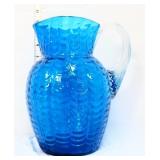 Blue draped 9in pitcher w/ clear handle