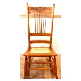 Vintage oak cane bottom rocking chair