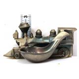 Vntg metal locomotive shape pipe rest