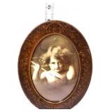 Vintage framed oval Cupid Awake art