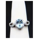 Sterling oval cut blue topaz ring, lab created