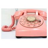 Vintage pink rotary telephone
