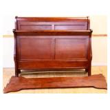 Sleigh bed with wood rails
