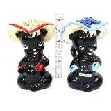 Pair vntg 6in skunk  head vases