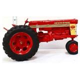 Die cast metal Farmall 560 tractor