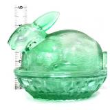 Green glass bunny on nest