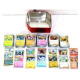 Lot of assorted Pokemon cards in tin