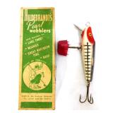 Vintage lure box with a lure