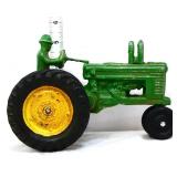Metal John Deere Model A tractor w/ driver