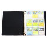 Lot of Pokemon cards in binder