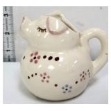 Figural pig creamer with flowers