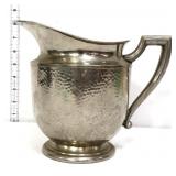 Hammered metal pitcher